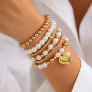 Minimally designed pearl bead bracelet with fashion sense and heart-shaped hollow Bracelet set