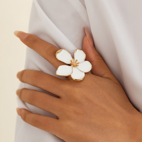 Personalized drip oil five petal flower three-dimensional ring with exaggerated metallic feel, starfish pearl ring